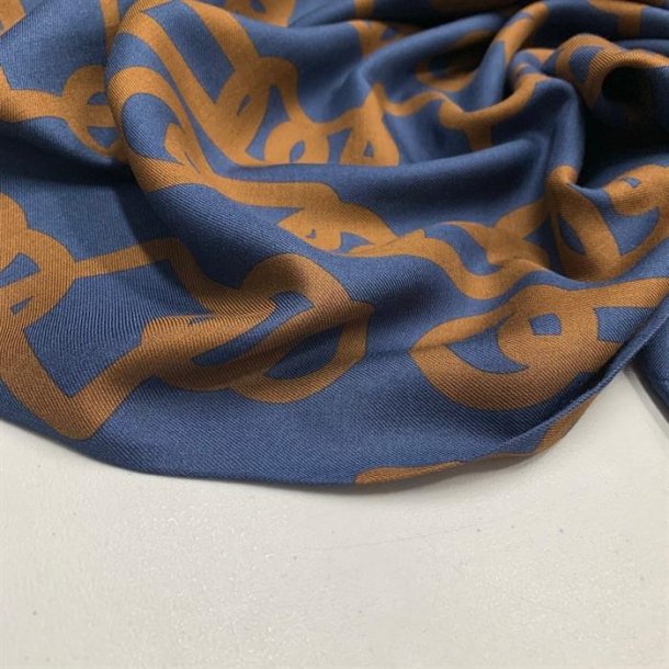 Bld viskose i bl med mnster i brun sukker - pr. 0,25 meter